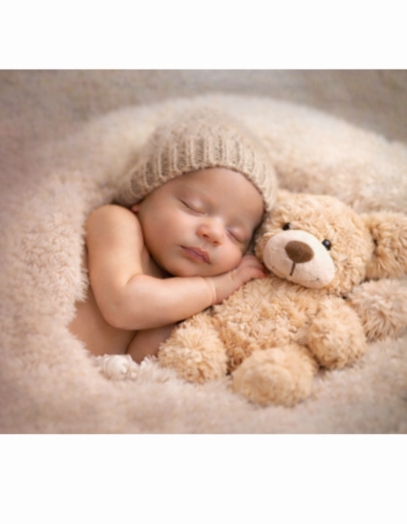 A peacefully sleeping newborn baby
